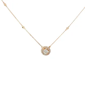 14k Rose Gold .58ct G SI1 Center Round Diamond and along the halo .42ct G SI1 Round Diamond Solitaire Necklace
