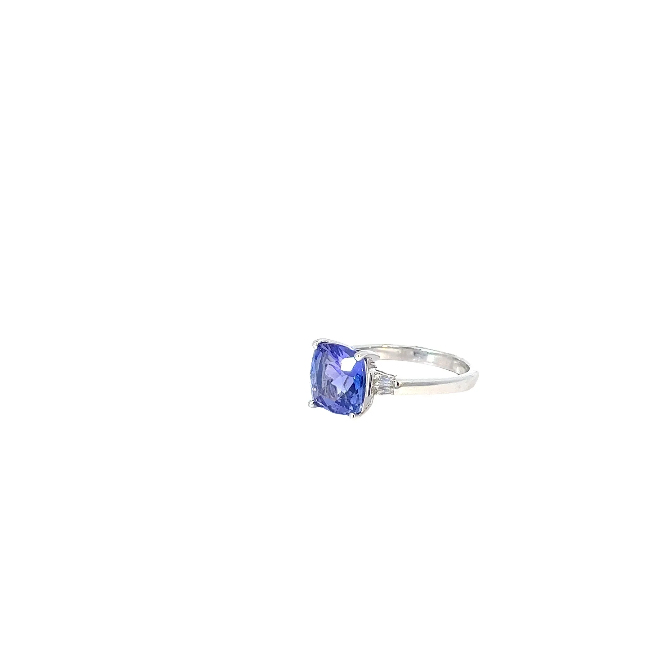 14k white gold 3.44ct Cushion Shaped Tanzanite and .15ct G VS2 Baguette Diamond Ring