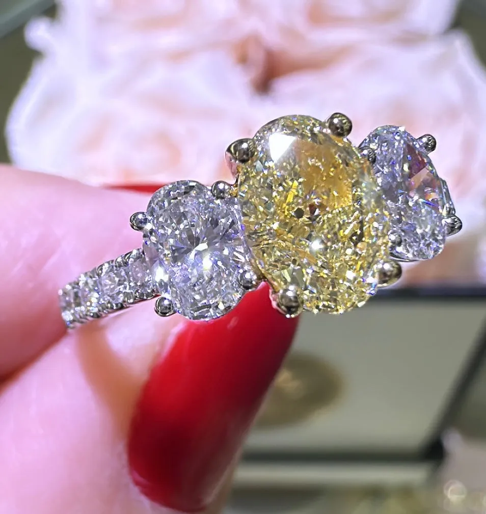 1.97ct tw Oval Canary Fancy Yellow Three Stone Diamond Ring