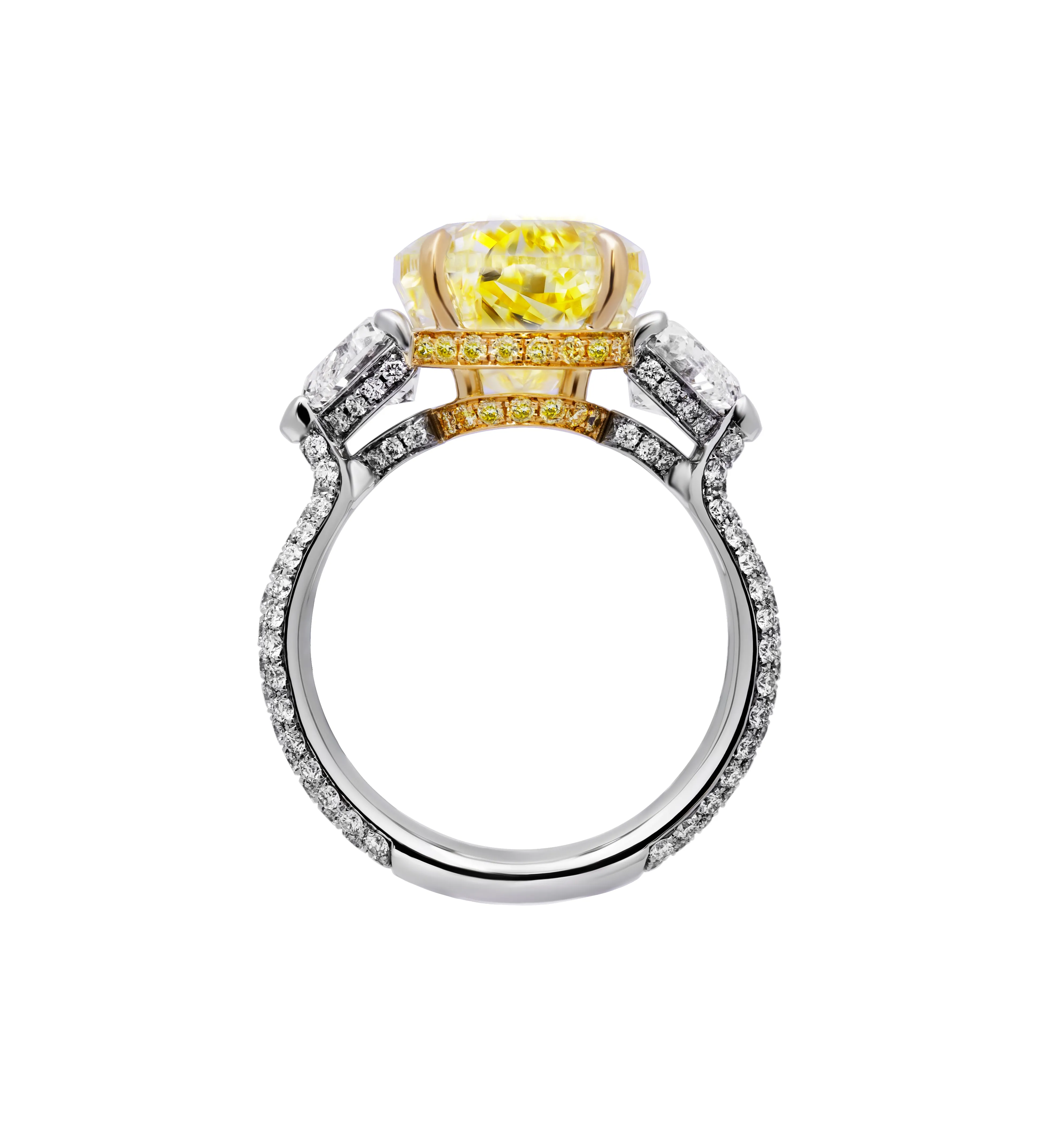 GIA Certified 3 Stone ring with 7.78ct Fancy Yellow Pear Shape Diamond
