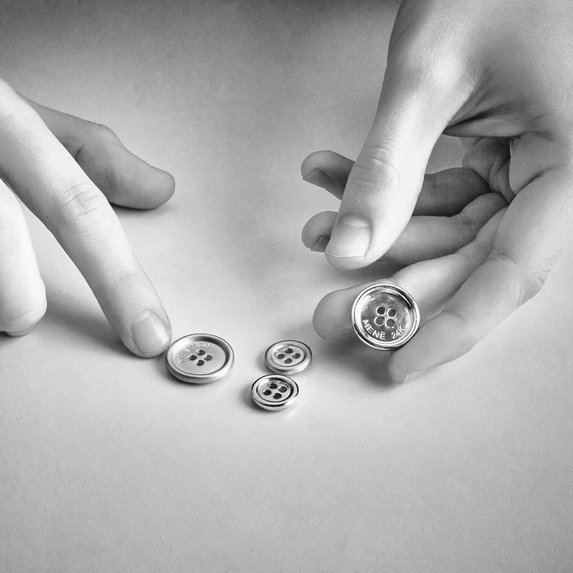 Menē Button II