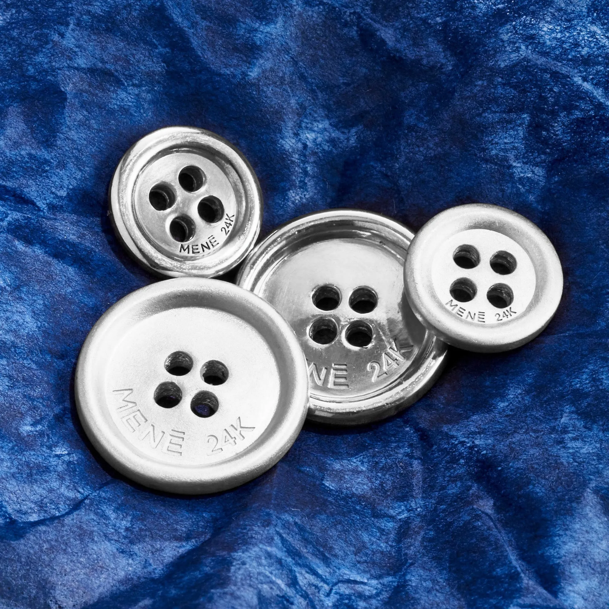 Menē Button II