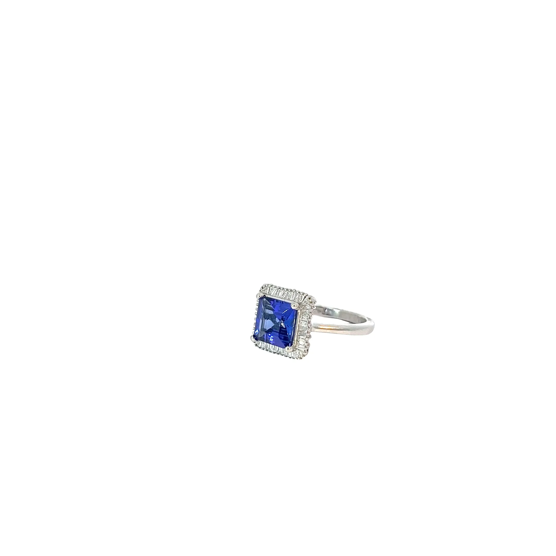Platinum 3.20ct AAA Asscher Tanzanite and Surrounded by .37ct F VS2 Baguette Diamond Ring